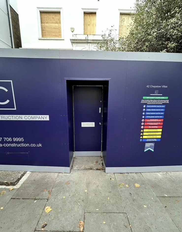Bespoke hoarding, photo 2: Hoarding clad with cut and folded edges and a PED gate