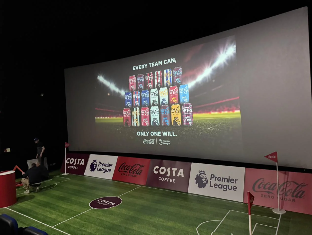 Coca-Cola x Costa x Premier League, photo 1: Odeon IMAX Greenwich: floor laminate, Toblerone signage, door vinyl and red carpet