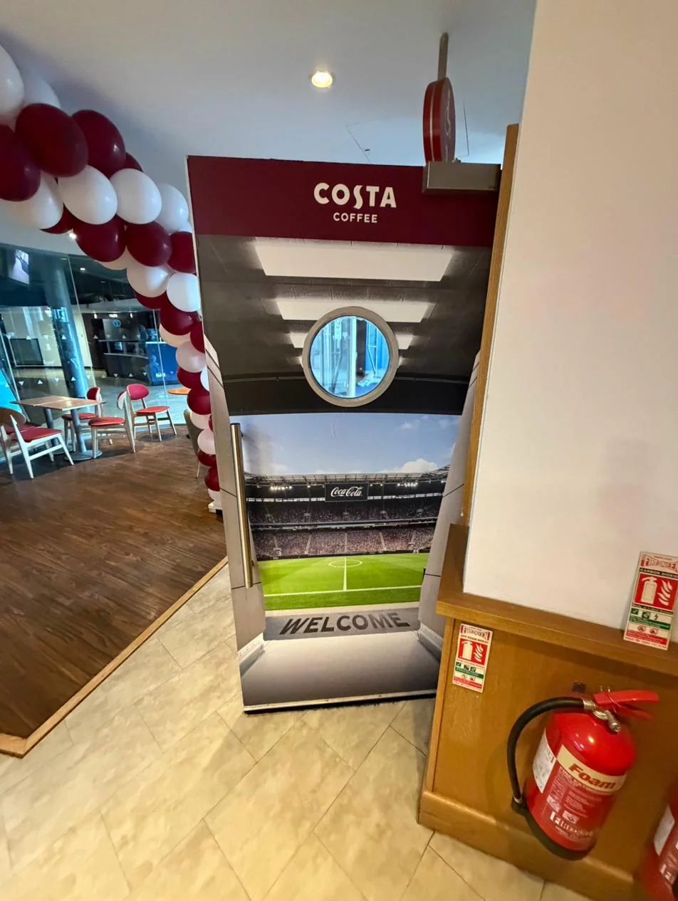 Coca-Cola x Costa x Premier League, photo 2: Odeon IMAX Greenwich: floor laminate, Toblerone signage, door vinyl and red carpet