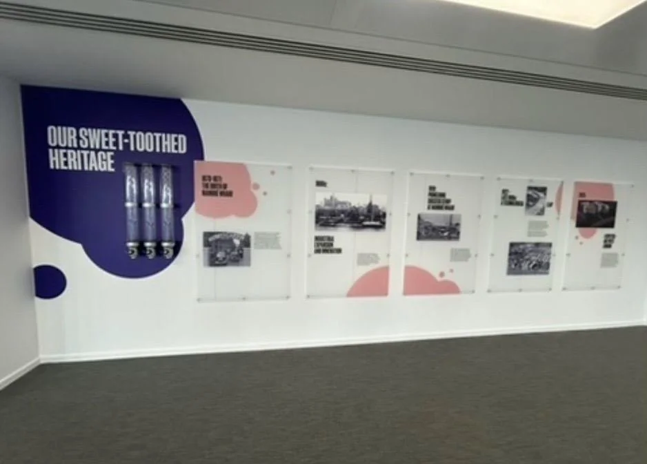 Event vinyl and acrylic, photo 1: Acrylic panels on stand-offs with wall vinyl, large vinyl text on glass