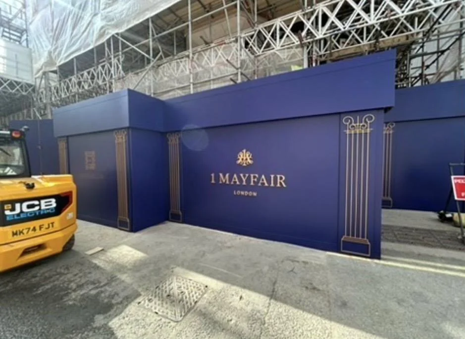 Mayfair hoarding, photo 2: Hoarding clad with built-up letters