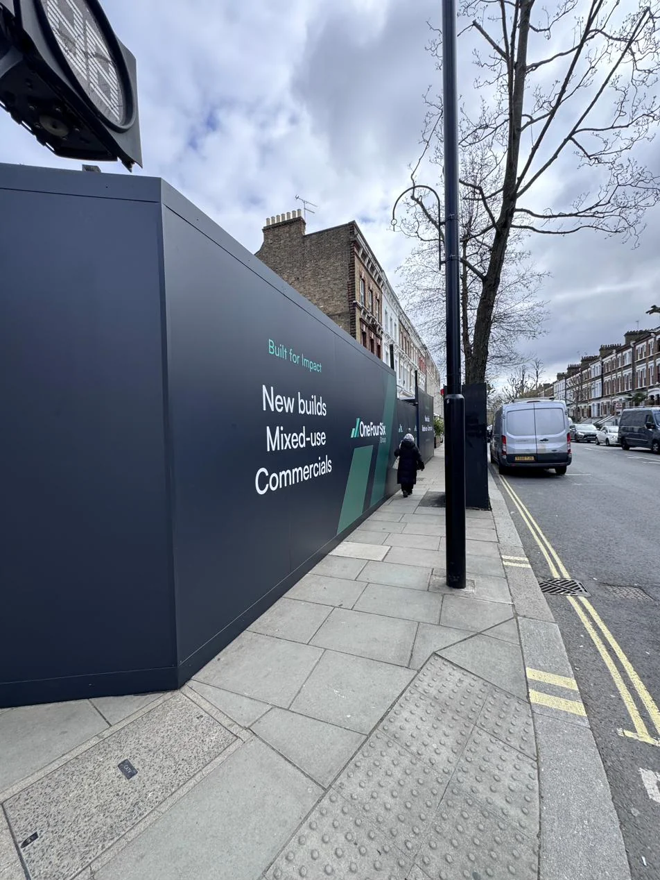 3-metre hoarding, photo 6: 3-metre hoarding clad